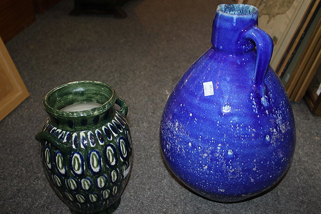 Appraisal: A LARGE POTTERY BLUE GLAZE JUG cm and a continental