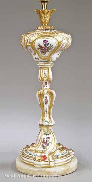 Appraisal: A Meissen-Style Polychrome Porcelain Lamp with swirling scroll forms on