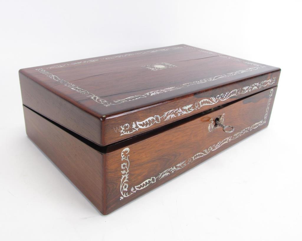 Appraisal: An English lap desk Rosewood with mother of pearl inlay