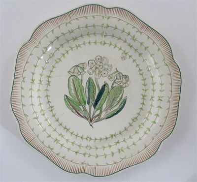 Appraisal: A Wedgwood plate by Louise Powell painted to the well