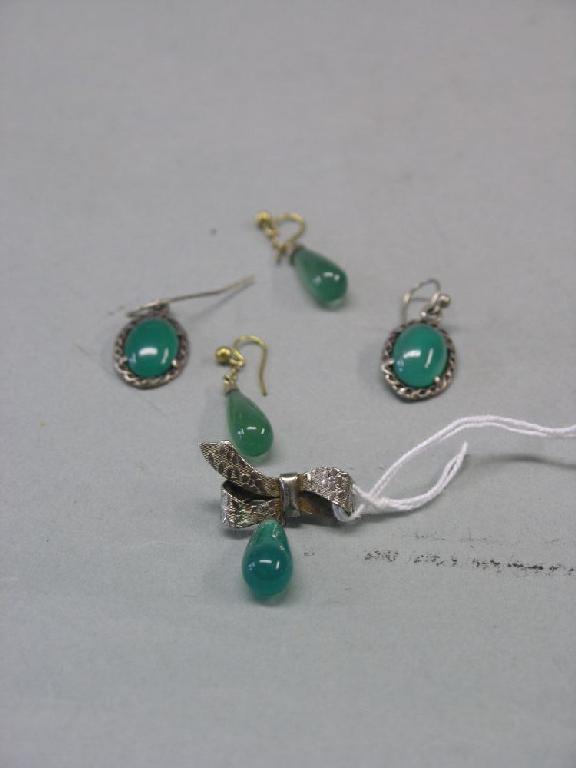 Appraisal: A pair of jade type ear-rings a pair of white