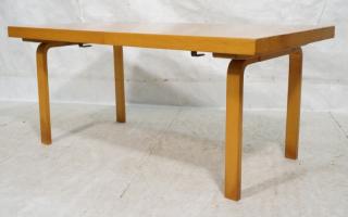 Appraisal: Alvar Aalto Dining Table Curved Laminate legs with thick top