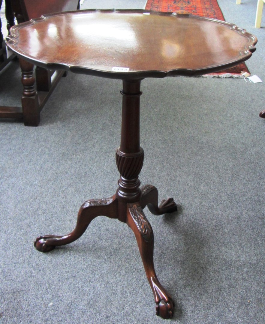 Appraisal: A th century mahogany snap top tripod occasional table cm