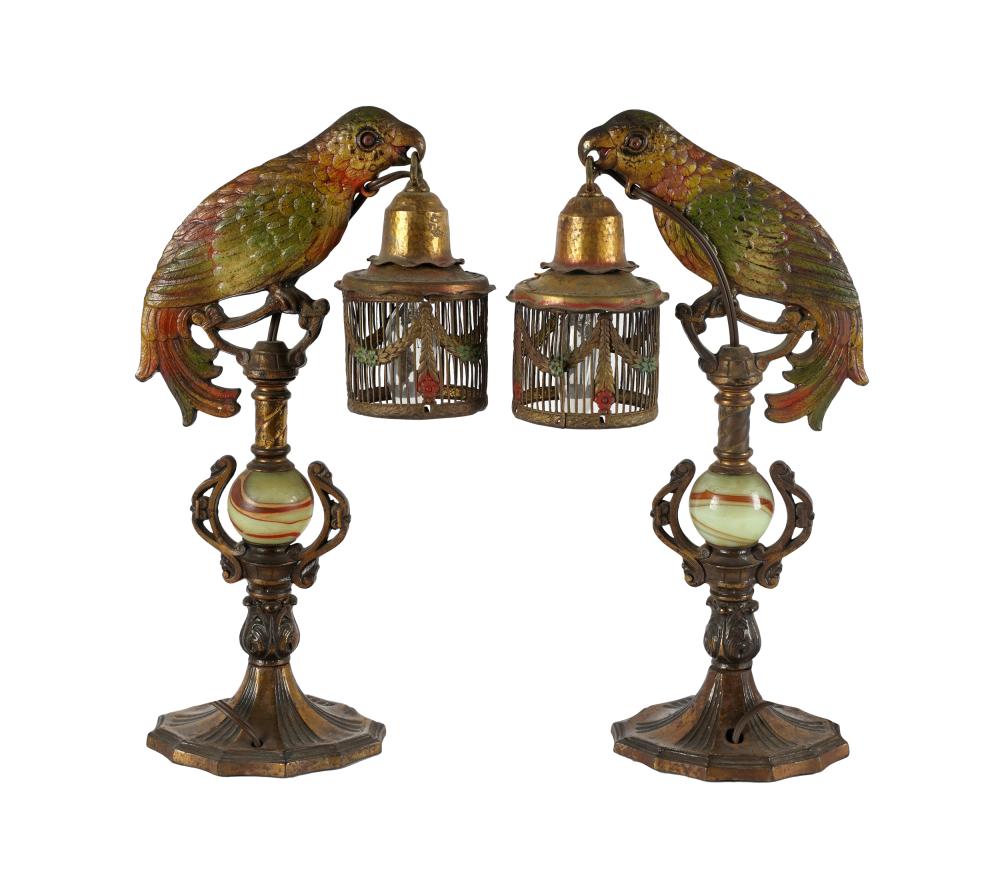 Appraisal: ATTRIBUTED TO BRADLEY HUBBARD PAIR PARROT LAMPScold-painted metal and colored