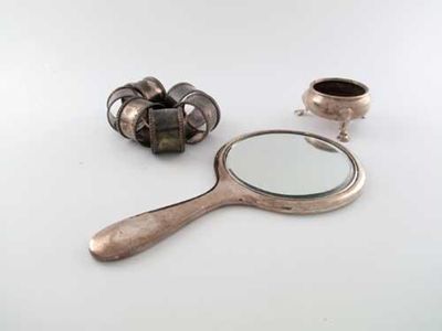 Appraisal: A George II salt a tortoiseshell backed hand mirror and