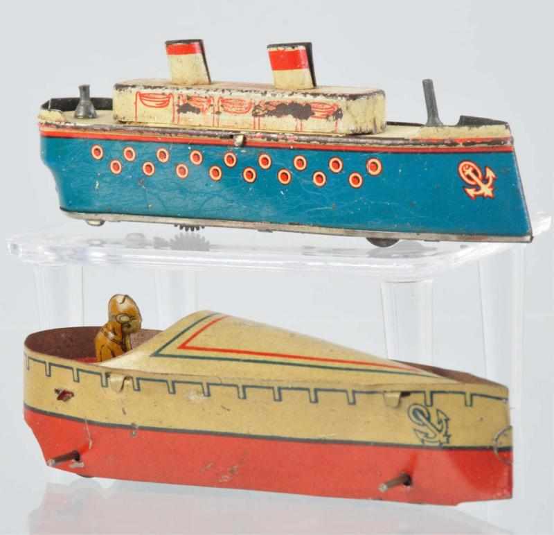 Appraisal: Lot of Tin Litho Boat Penny Toys German Includes one