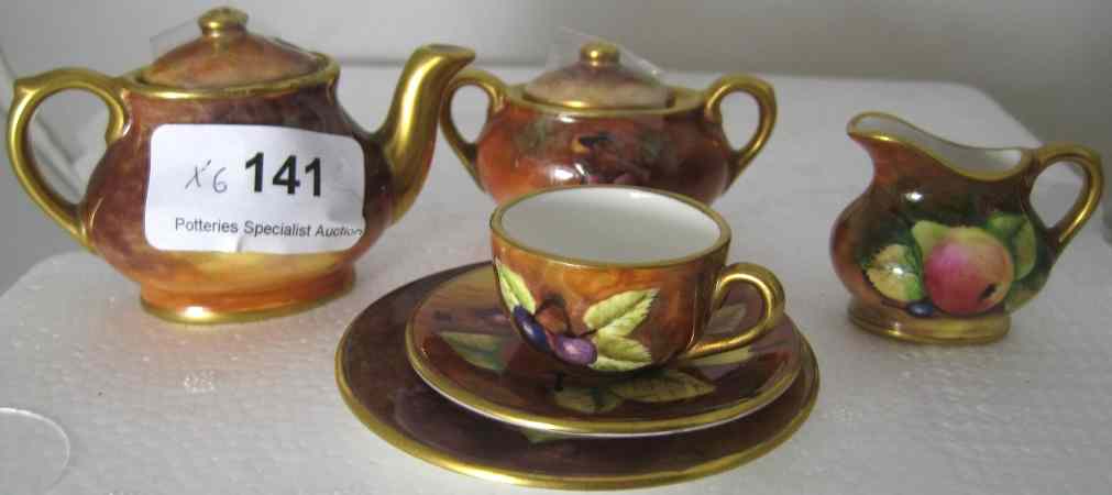 Appraisal: Coalport Miniature Tea Service Handpainted Fruits comprising Teapot Covered Sugar