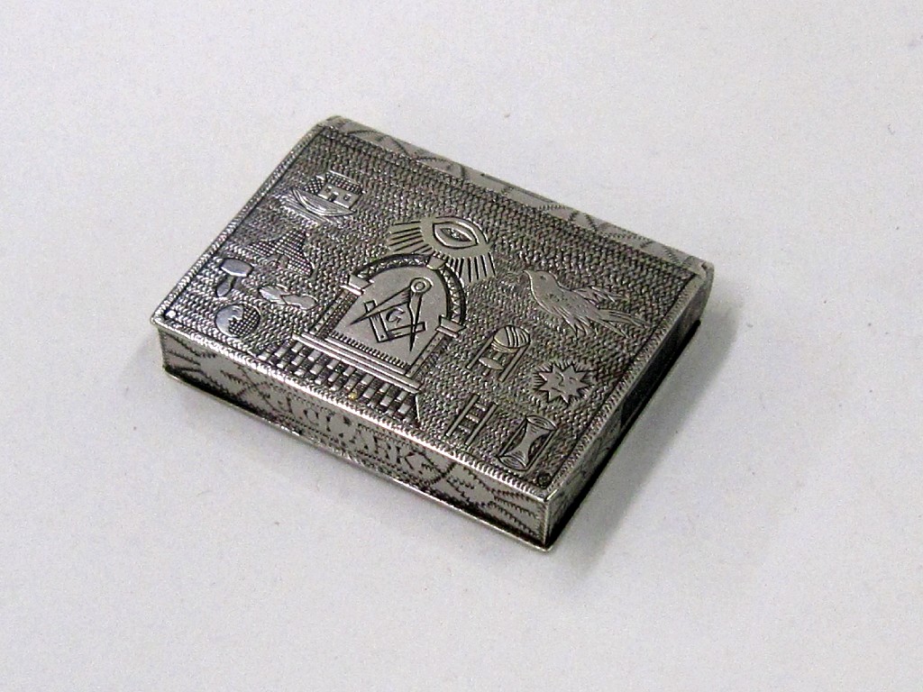 Appraisal: White metal vesta decorated with Masonic symbols