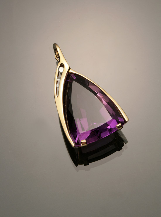 Appraisal: -Karat Yellow-Gold Amethyst and Diamond Enhancer The twin-prong and bezel