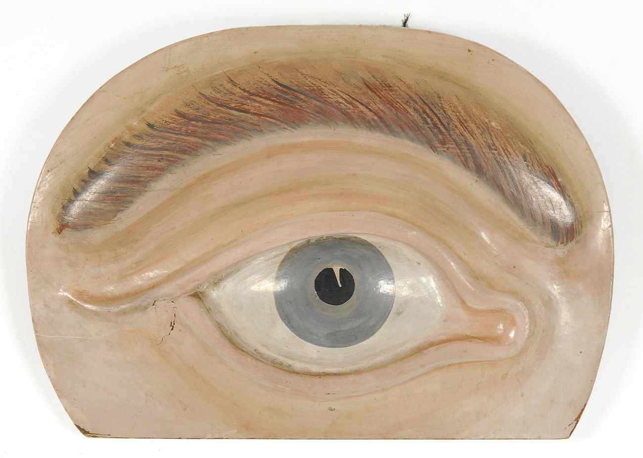 Appraisal: PAINTED WOODEN SIGN IN THE FORM OF AN EYEAmerican th