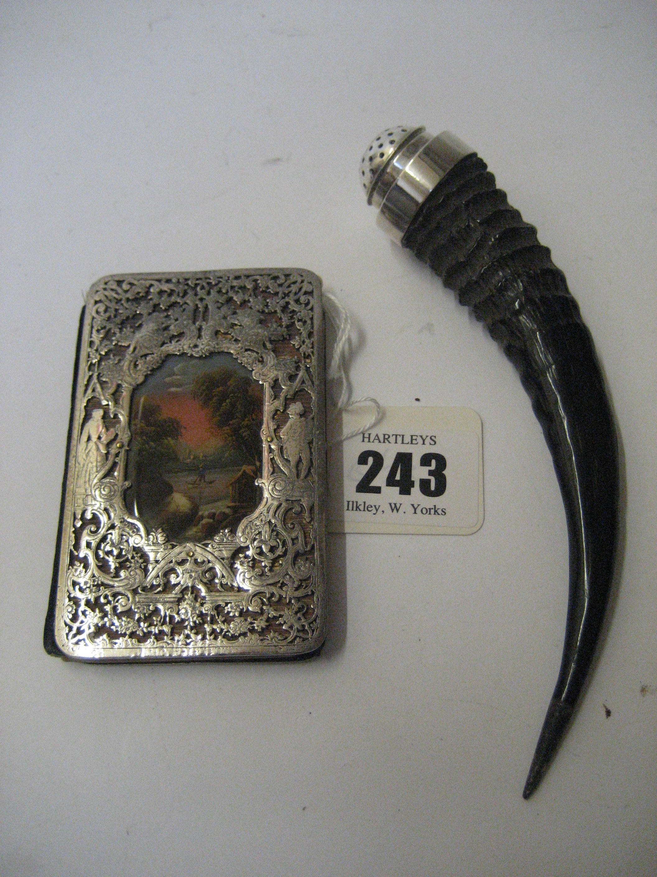 Appraisal: A SNUFF MULL the polished horn with white metal mount