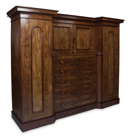 Appraisal: A Victorian mahogany inverted breakfront compactum the projected moulded cornice