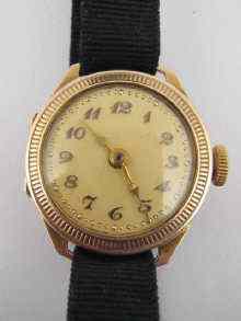 Appraisal: A ct gold lady's wrist watch on a silk strap