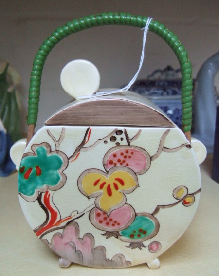 Appraisal: A Clarice Cliff biscuit barrel of Bonjour shape decorated with