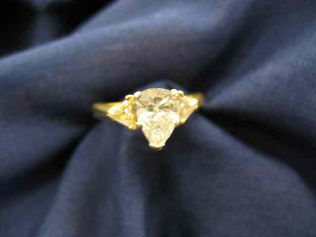 Appraisal: Diamond Ring carat pear shape diamond with triangular diamonds on