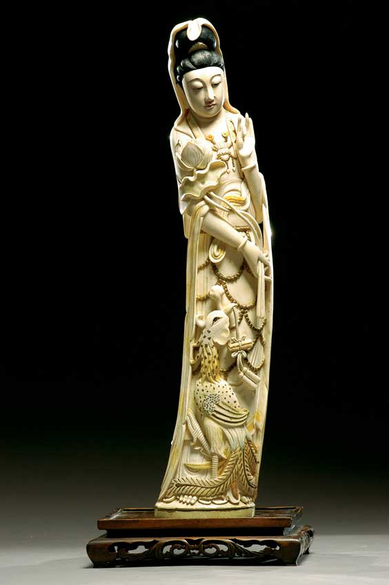 Appraisal: TALL OLD IVORY GUANYIN Tall old and well carved Chinese