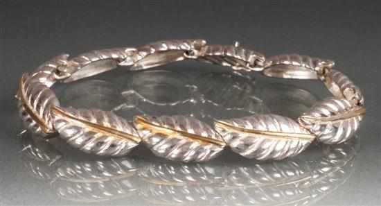 Appraisal: Tiffany Co sterling silver and gold link bracelet in length