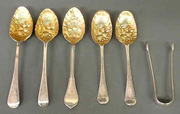 Appraisal: Five berry spoons approx l each with gold washed bowls-