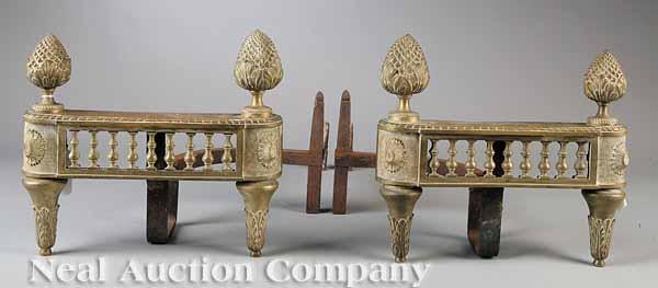 Appraisal: A Pair of Louis XVI-Style Cast Brass Chenets c marked