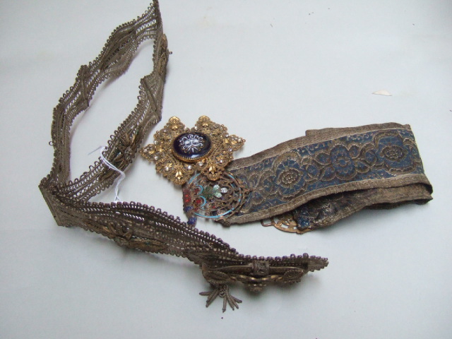 Appraisal: A filigree panel link waistbelt a gilt metal enameled and