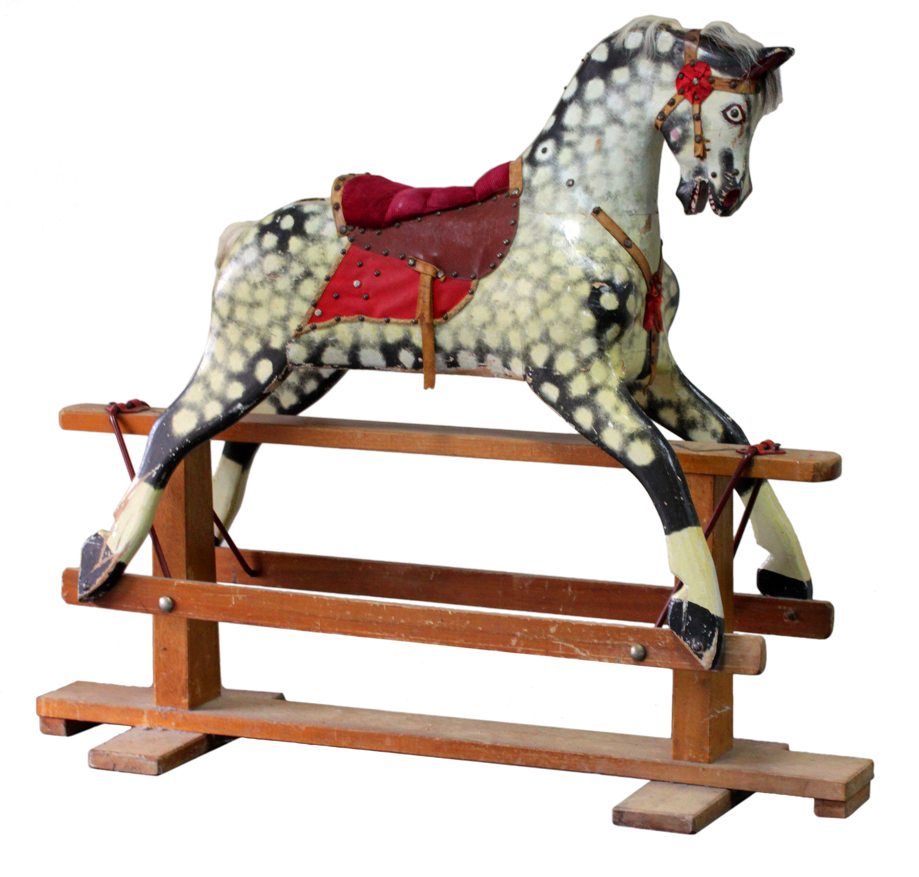 Appraisal: A dapple grey rocking horse on American rocker with red