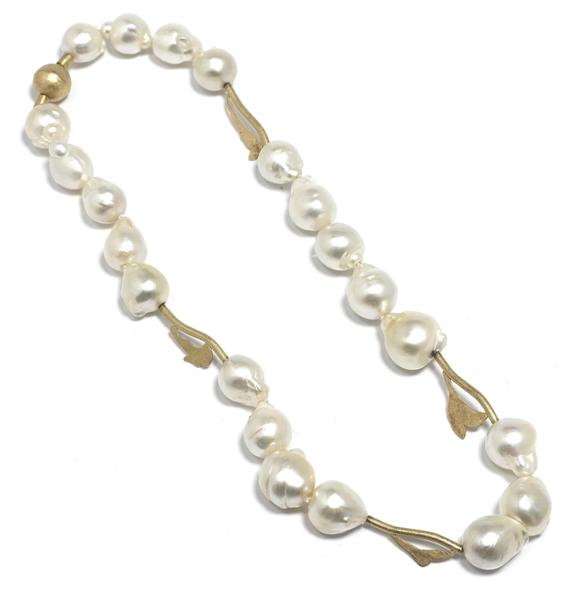 Appraisal: A PEARL AND GOLD NECKLACE Yellow gold Modern necklace composed