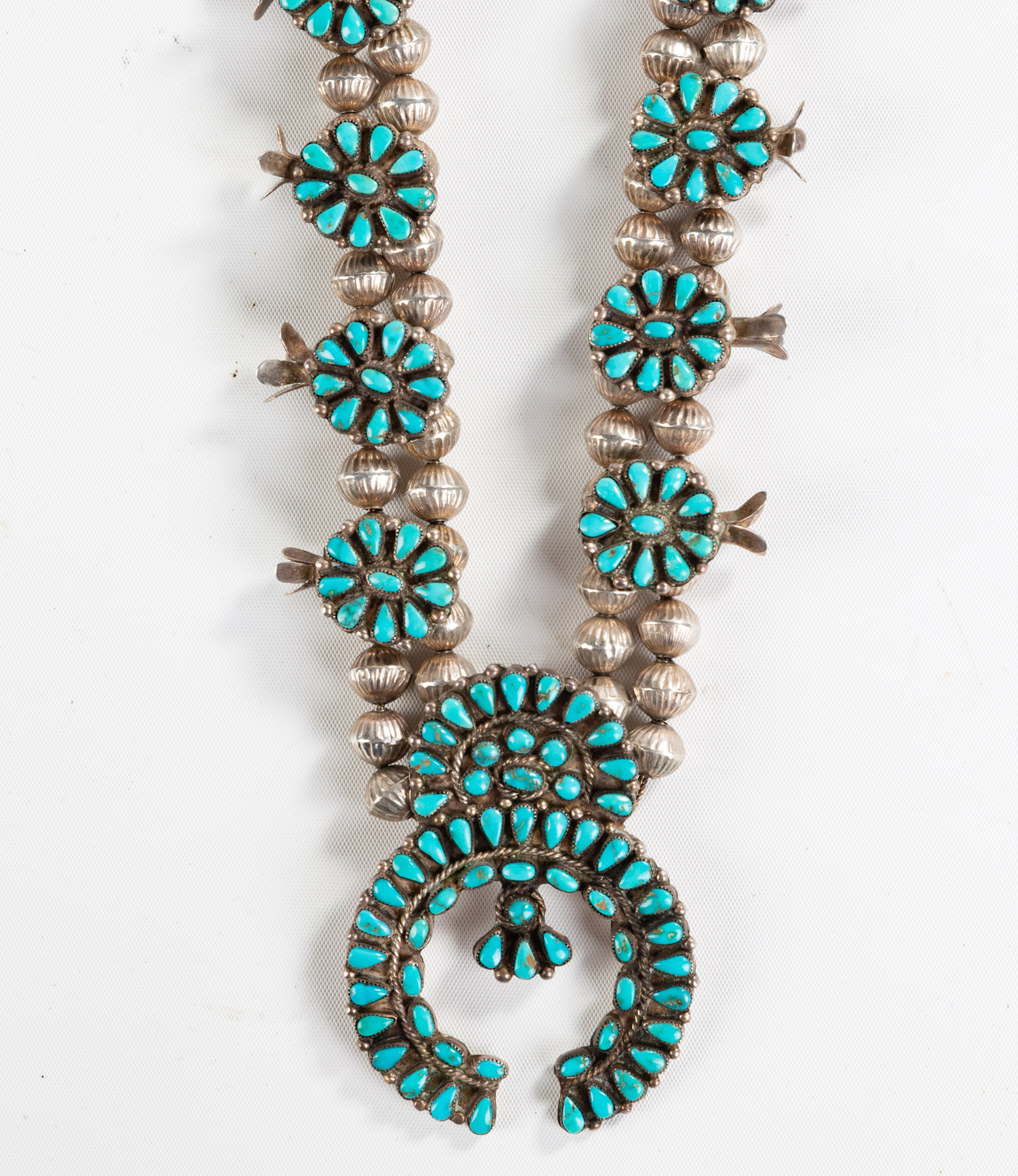 Appraisal: AMERICAN SOUTHWEST SQUASH BLOSSOM NECKLACE Southwest Native American Sliver and