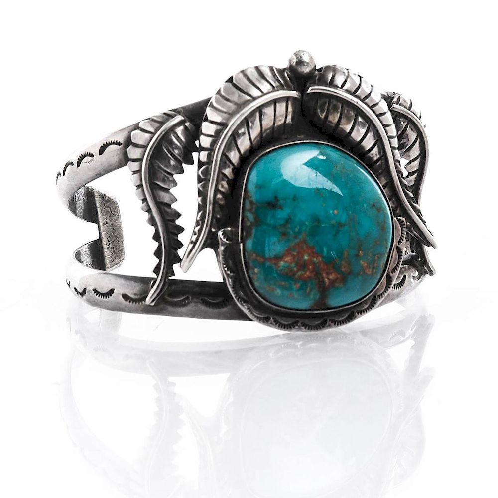 Appraisal: NATIVE AMERICAN SILVER TURQUOISE CUFF Tooled leaves on top of