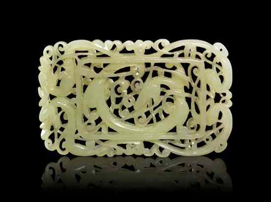 Appraisal: A Chinese Pierce Carved Jade Plaque of a near-white stone