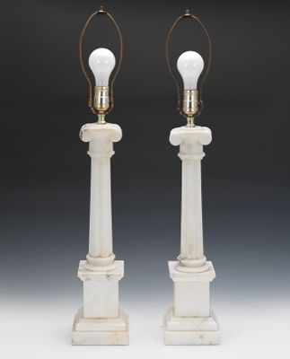 Appraisal: A Pair of White Marble Lamp Bases Glossy polished white