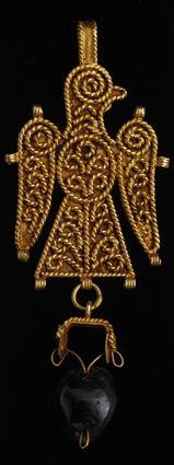 Appraisal: PERSIAN GOLD AND GARNET BIRD PENDANT in Provenance Property from