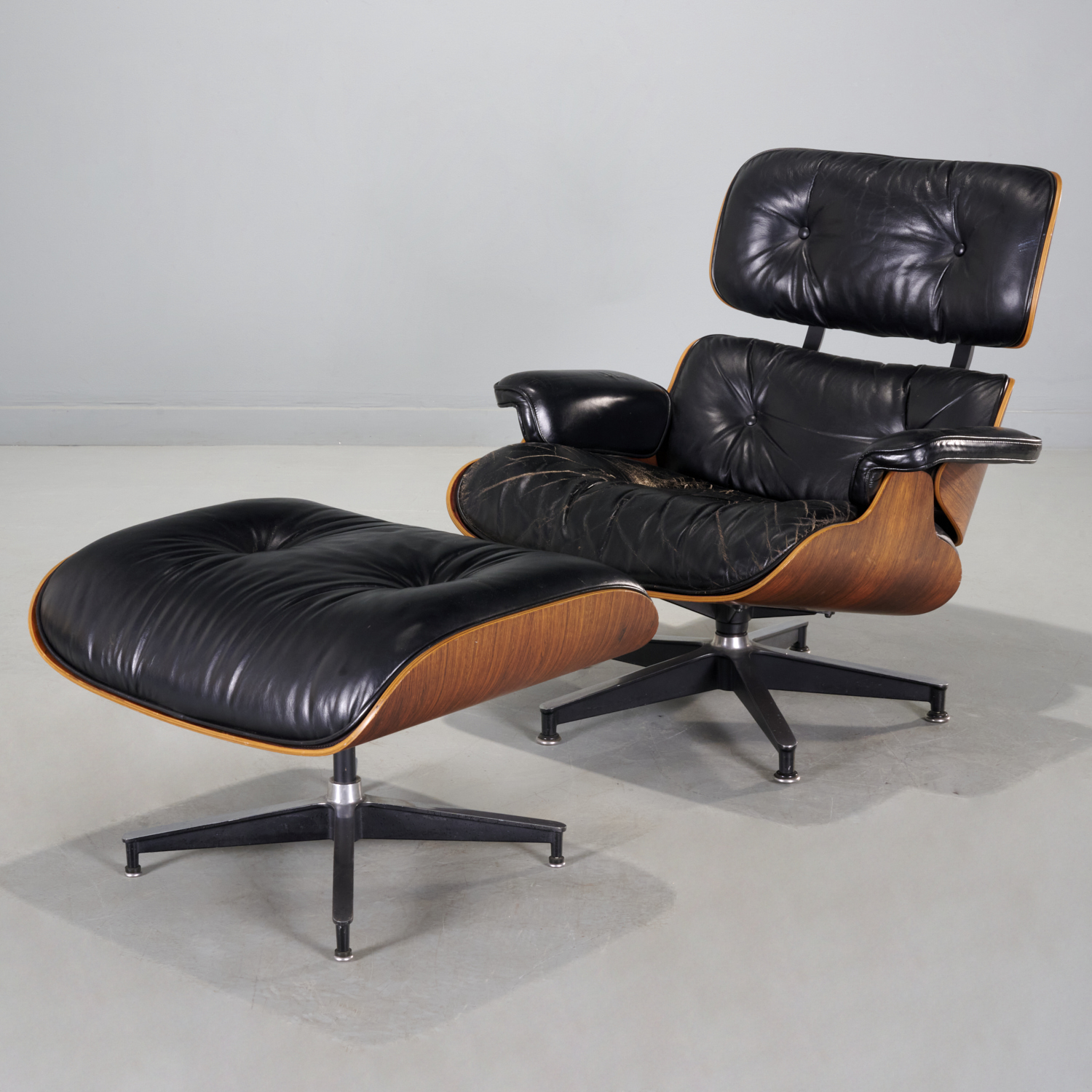 Appraisal: CHARLES AND RAY EAMES LOUNGE CHAIR AND OTTOMAN c USA