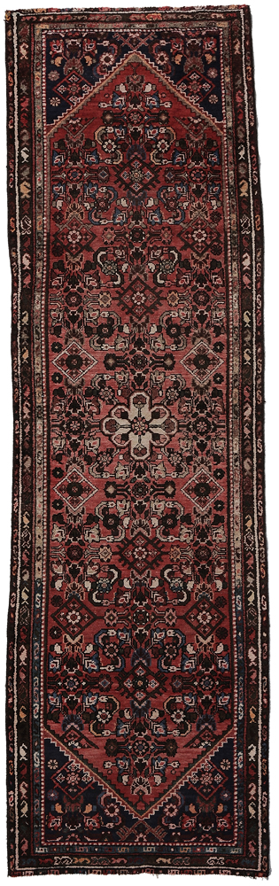 Appraisal: Hamadan Runner Persian th century repeating floral designs on red