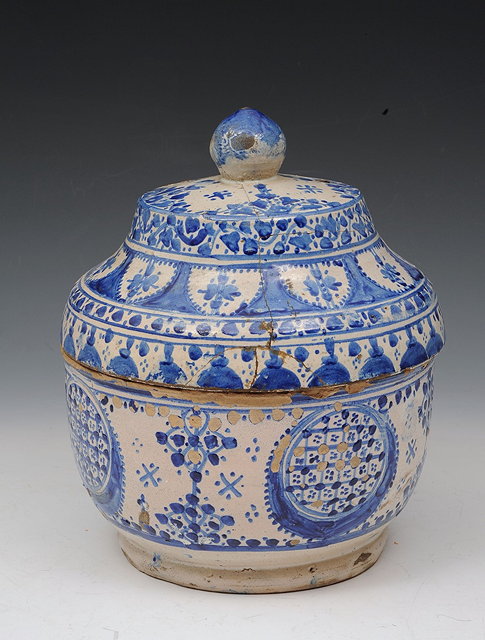 Appraisal: A MOORISH BLUE GLAZE POTTERY BOWL and cover with simple