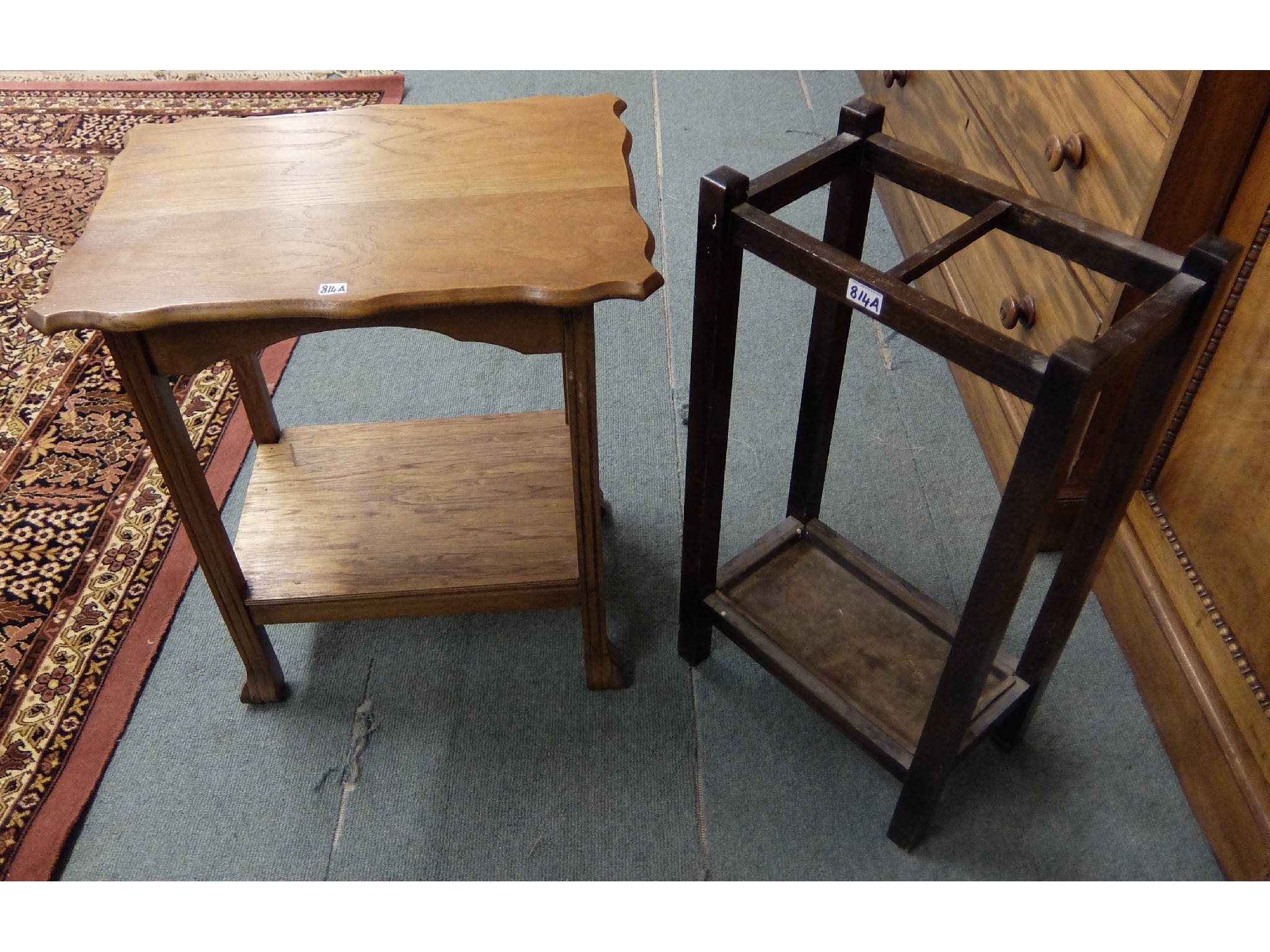 Appraisal: Oak stick stand and an oak occasional table