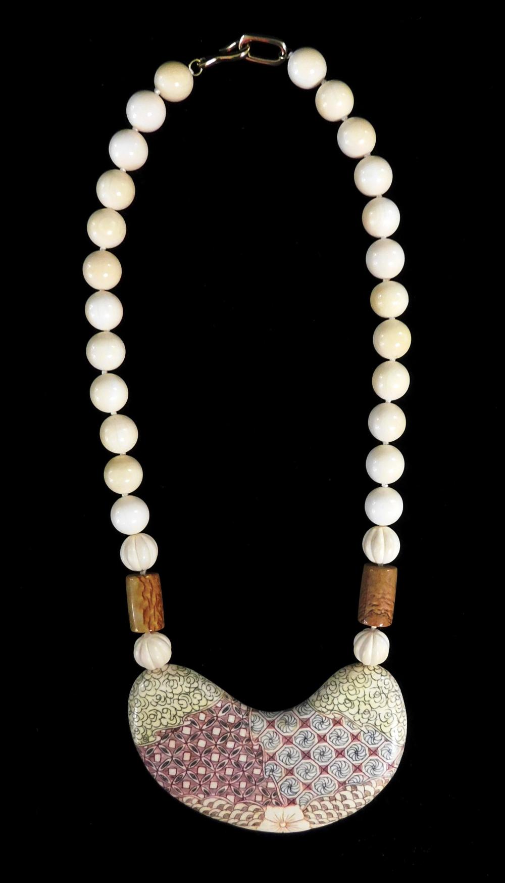 Appraisal: JEWELRY ASIAN MOTIF IVORY OR IVORY TYPE NECKLACE POLYCHROME INKED