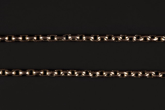 Appraisal: A YELLOW PRECIOUS METAL CHAIN composed of belcher links length