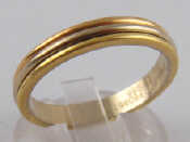 Appraisal: A Swiss hallmarked three colour carat gold ring by Cartier