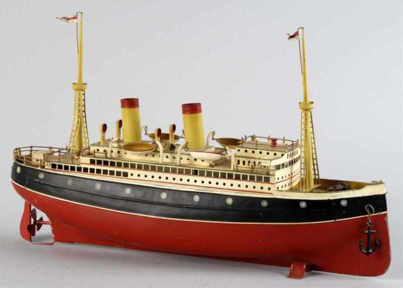 Appraisal: Handpainted Tin Bing Ocean Liner Clockwork Toy Description German Complete