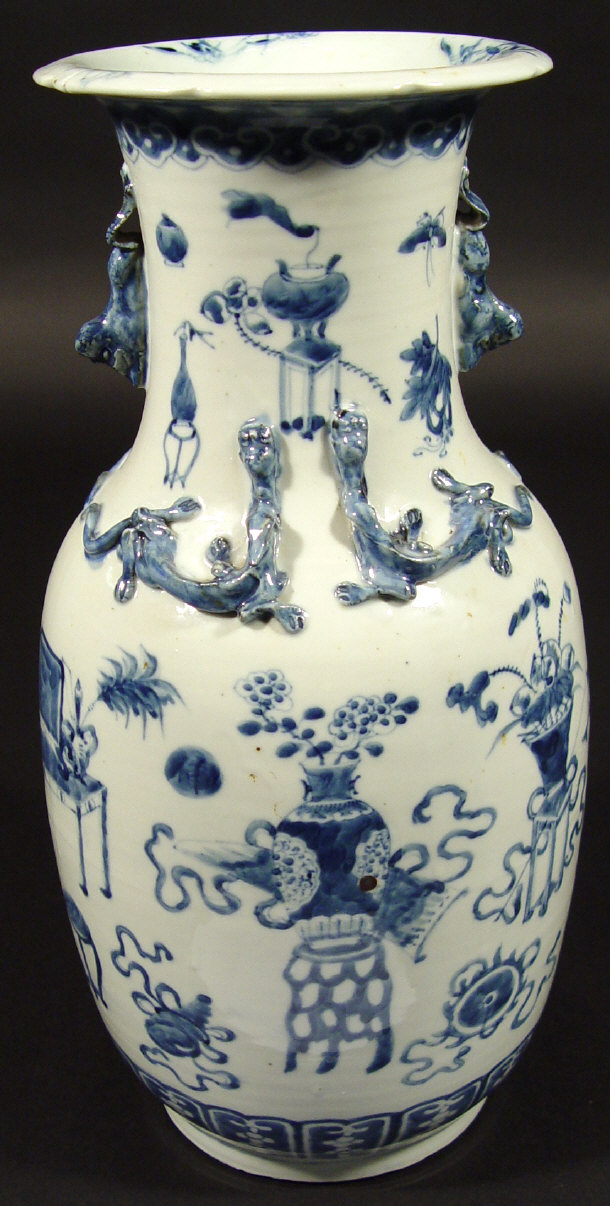 Appraisal: Oriental porcelain vase surmounted with dog of foo and lizards