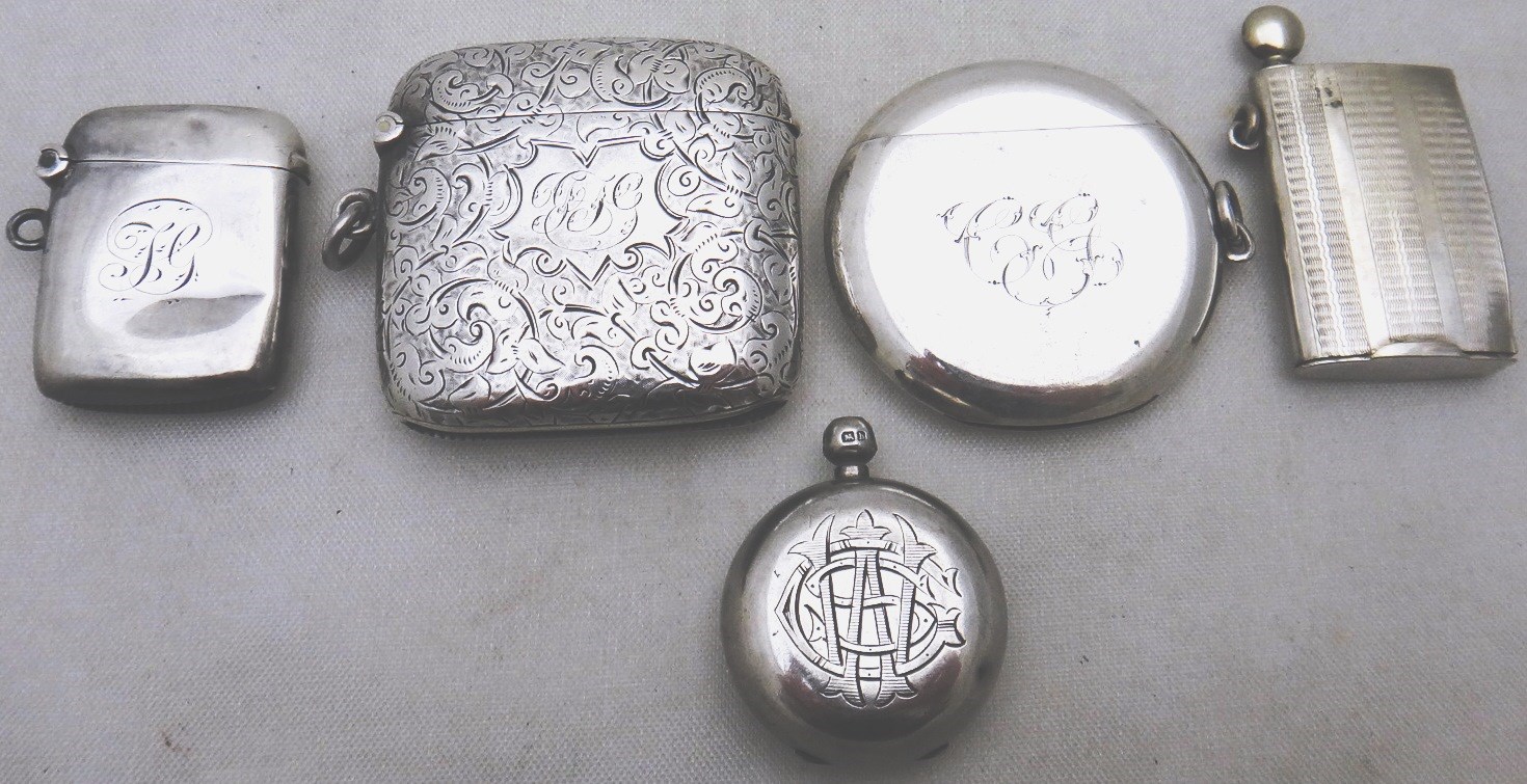 Appraisal: A silver circular vesta case monogram engraved Birmingham a silver