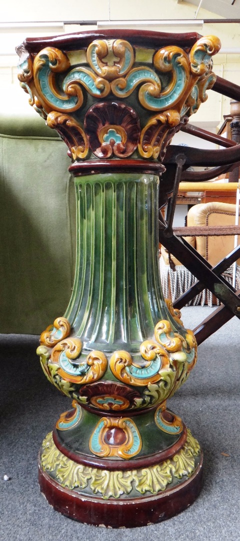 Appraisal: A th century Majolica jardiniere stand by Doulton Lambeth cm