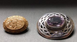 Appraisal: Georgian silver pin with large pale oval amethyst in chain