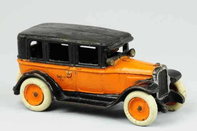 Appraisal: ARCADE FLAT TOP TAXI Cast iron taxi done in orange