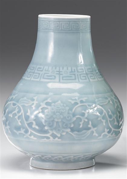 Appraisal: Chinese carved blue glazed Hu-shaped vase incised qianlong mark th