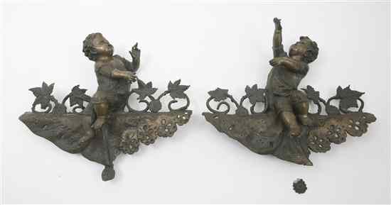 Appraisal: A Pair of Victorian Bronzed Metal Curtain Ties each depicting