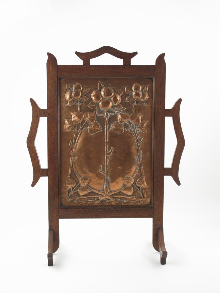 Appraisal: An oak mounted copper fire screen