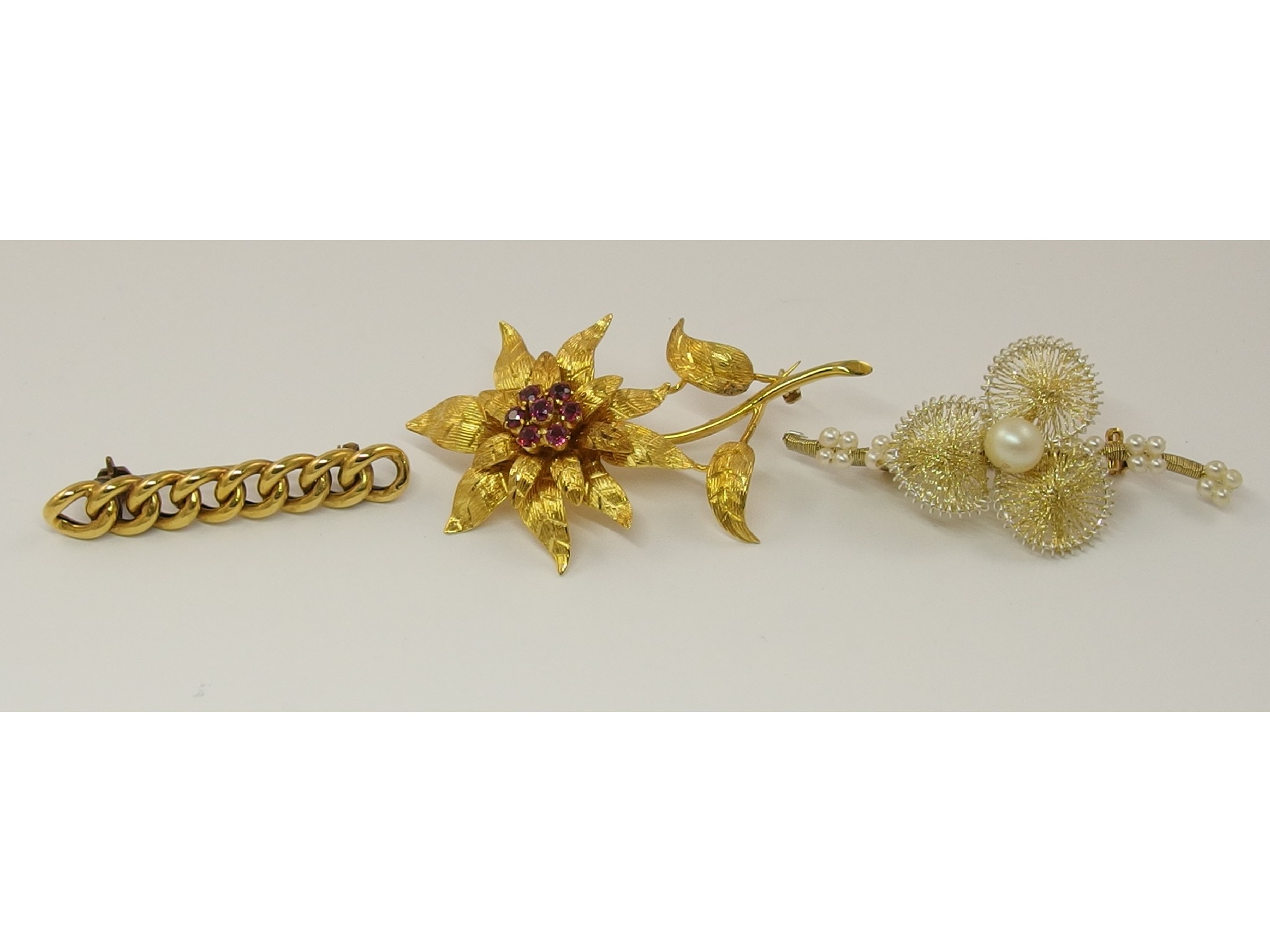 Appraisal: A ct flower brooch set with red gem stones a