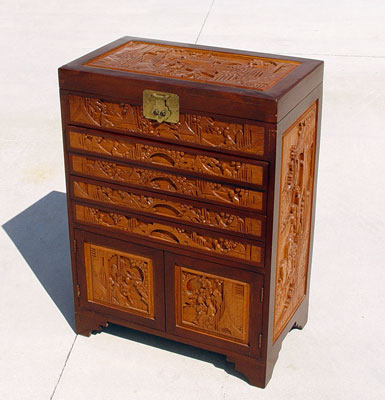 Appraisal: CHINESE CARVED TEAK SILVER CHEST Upright cabinet ''h x ''