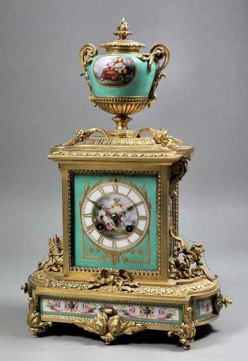 Appraisal: A th Century French ormolu and porcelain mounted mantel clock